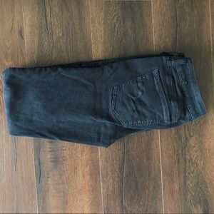 Black AEO skinny jeans with distressed knees